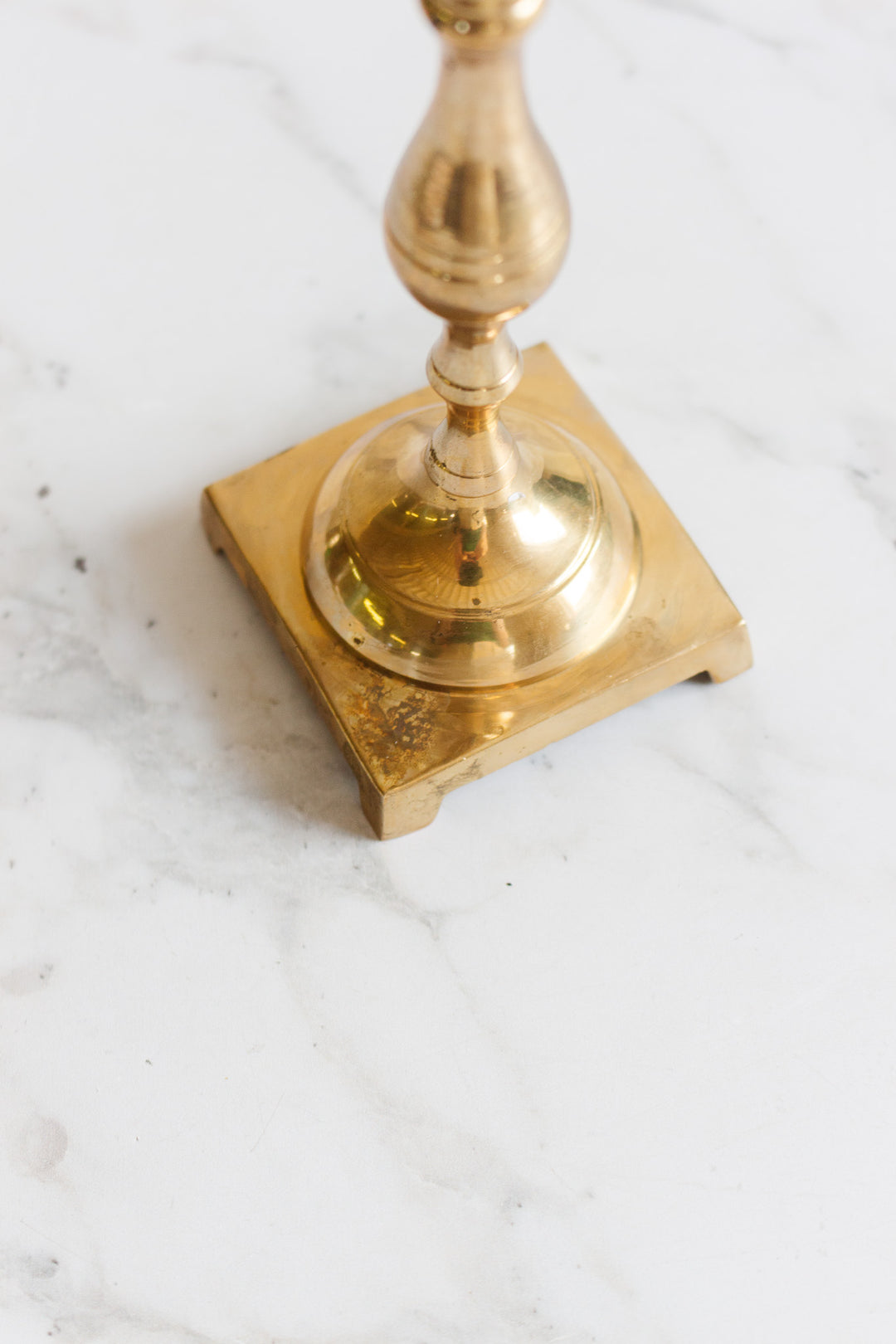pair of vintage quintessentially french brass candlesticks