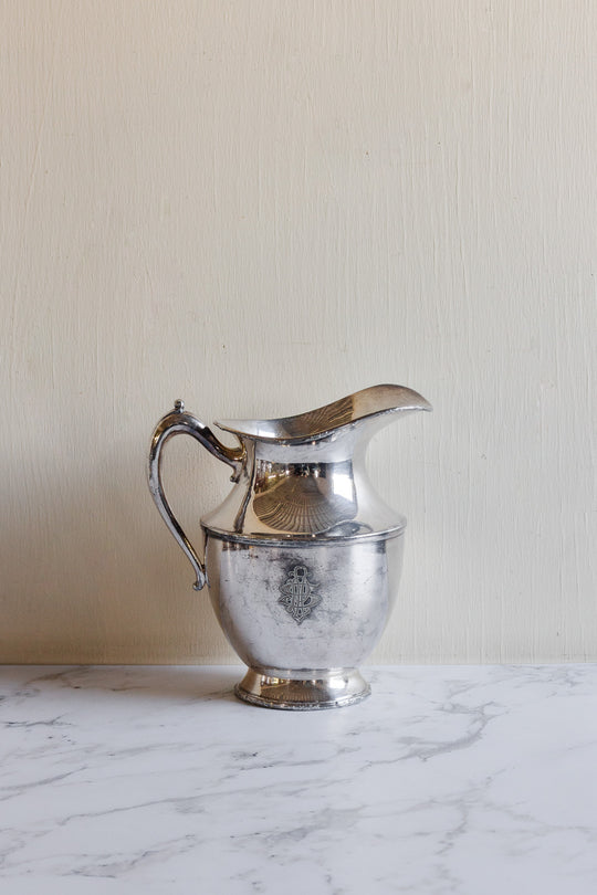 vintage silverplated silver water pitchers