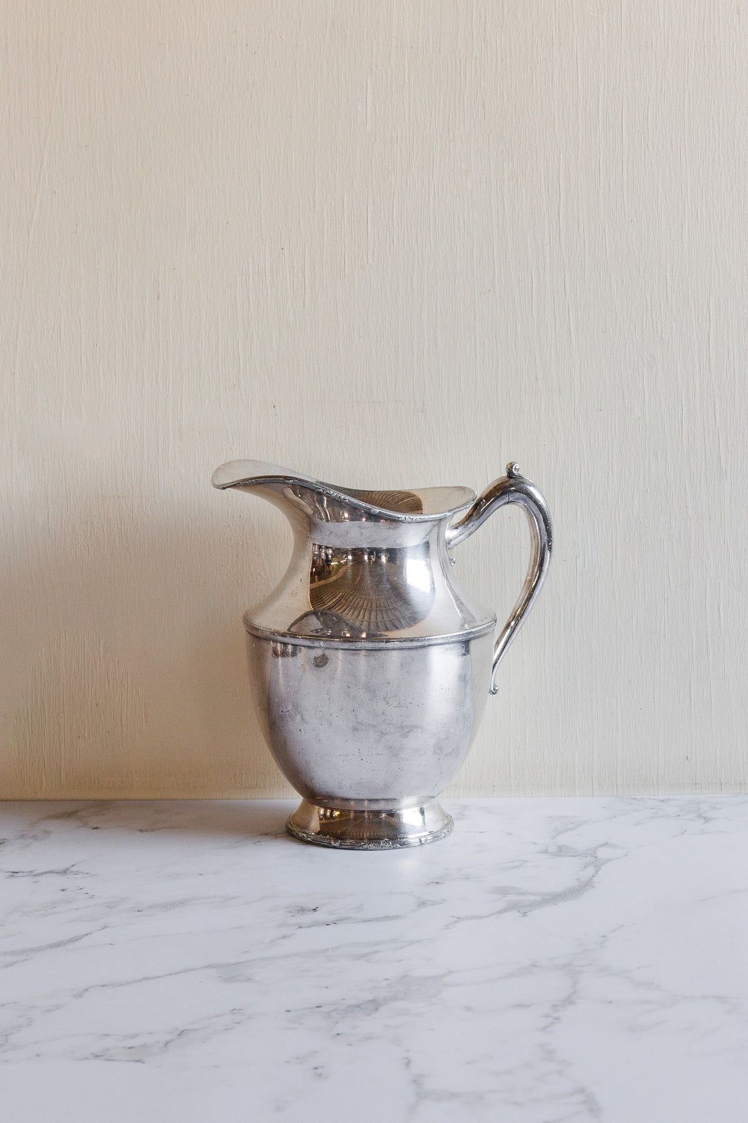 vintage silverplated silver water pitchers