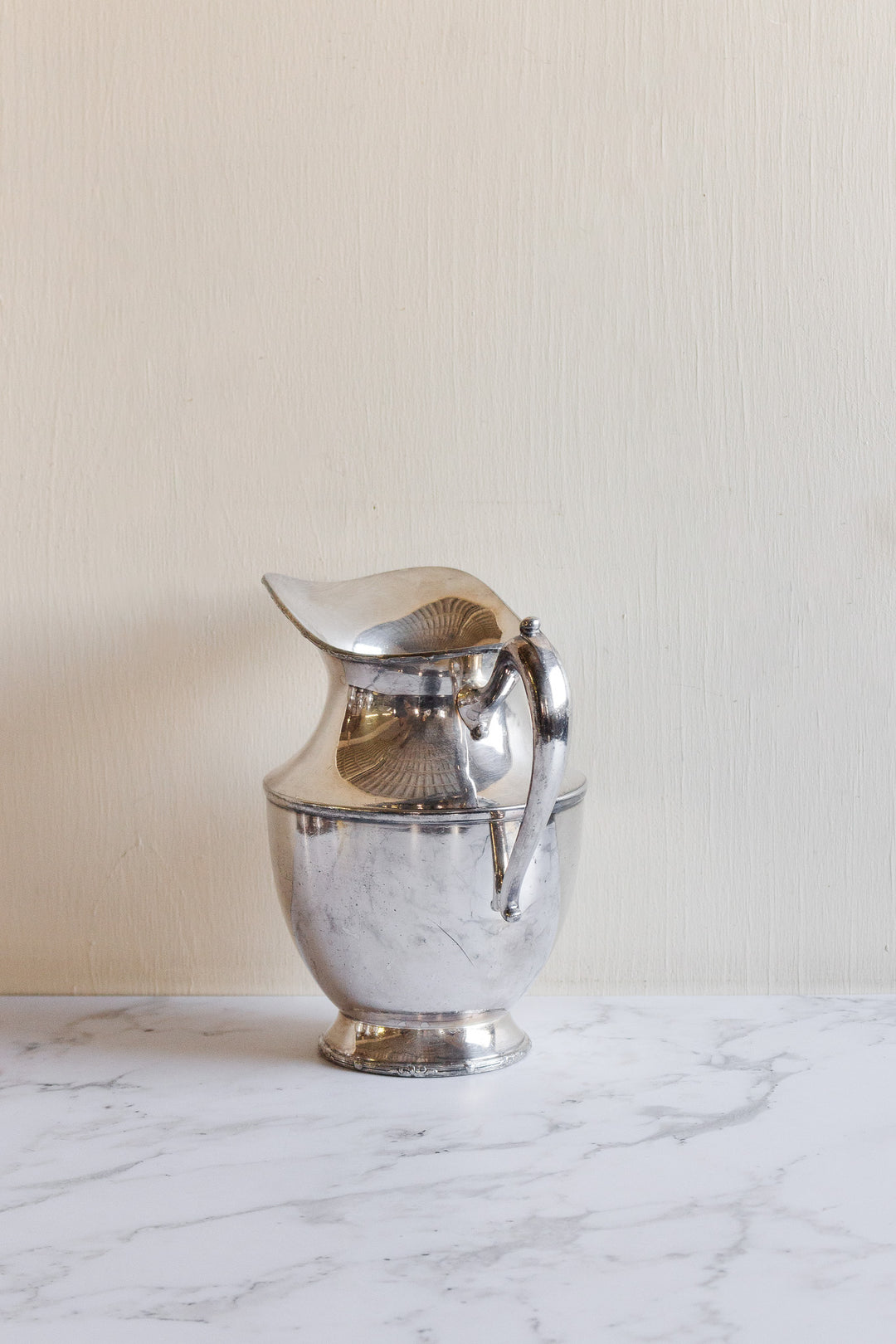 vintage silverplated silver water pitchers