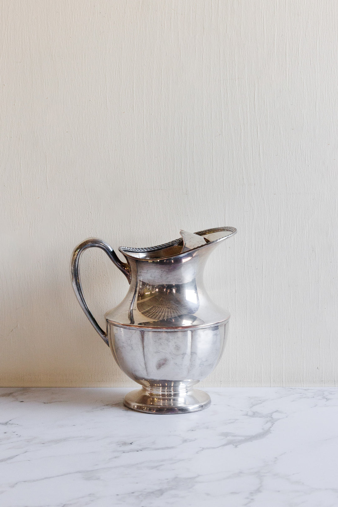 vintage silverplated silver water pitchers