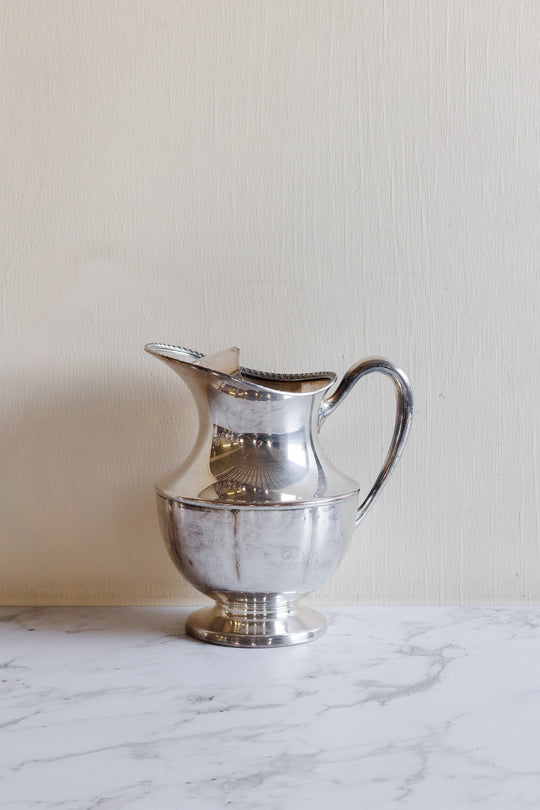 vintage silverplated silver water pitchers