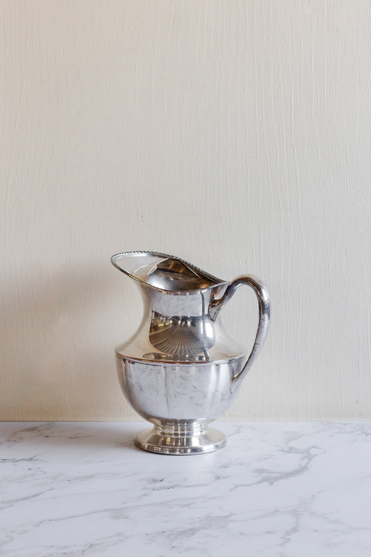 vintage silverplated silver water pitchers