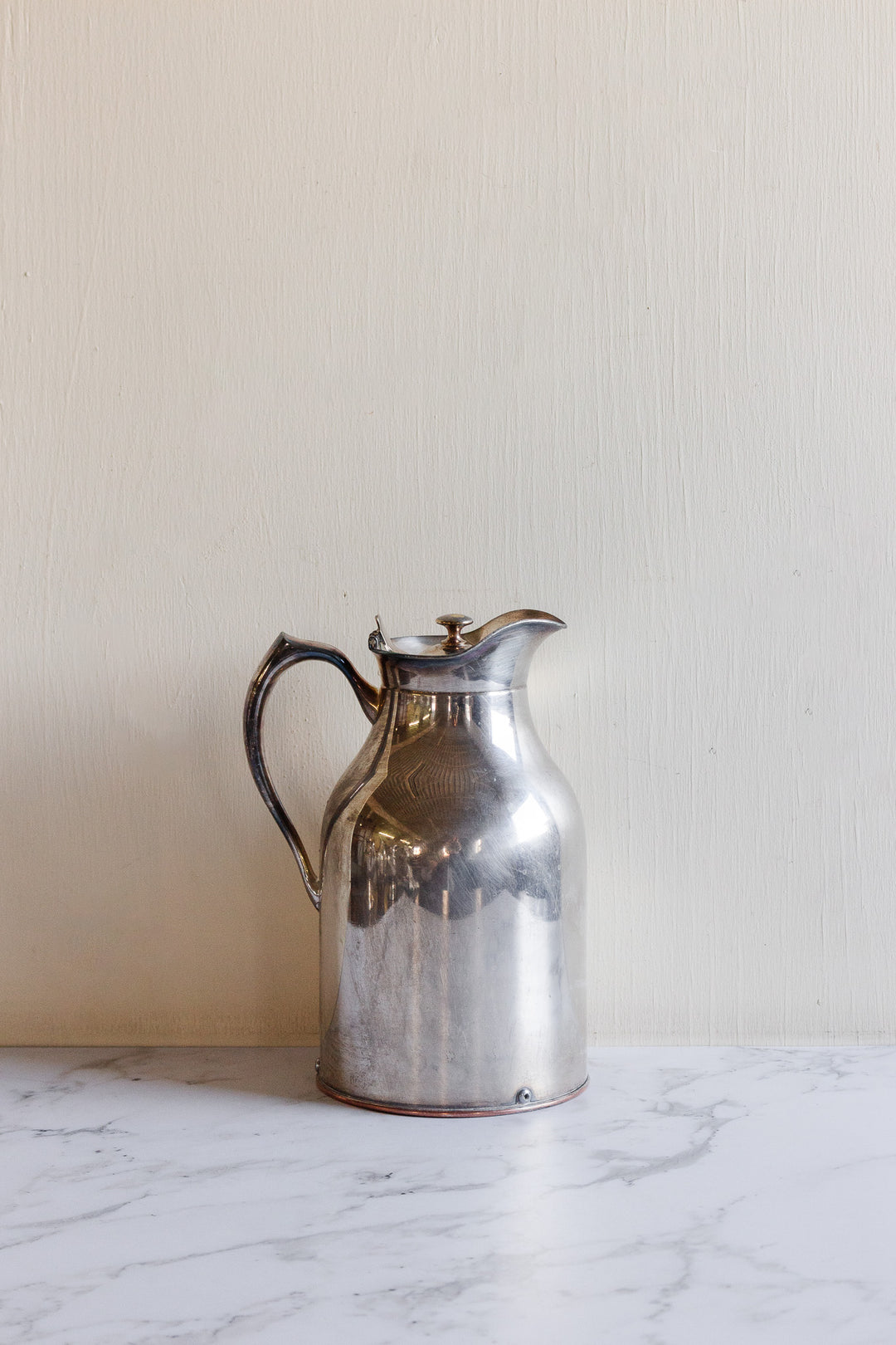 vintage silverplated silver water pitchers