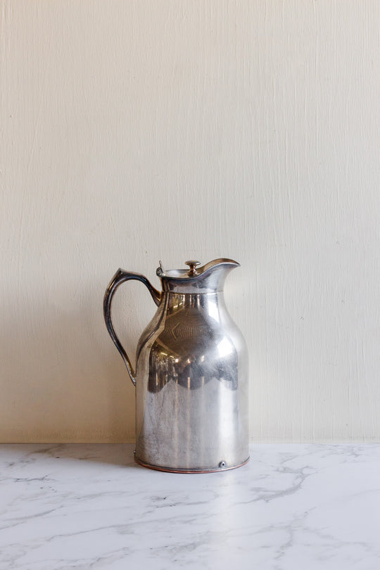 vintage silverplated silver water pitchers