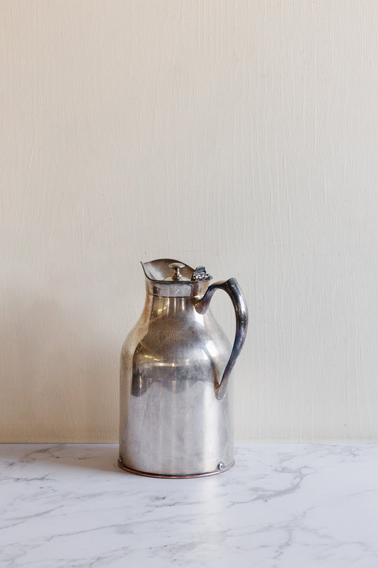 vintage silverplated silver water pitchers