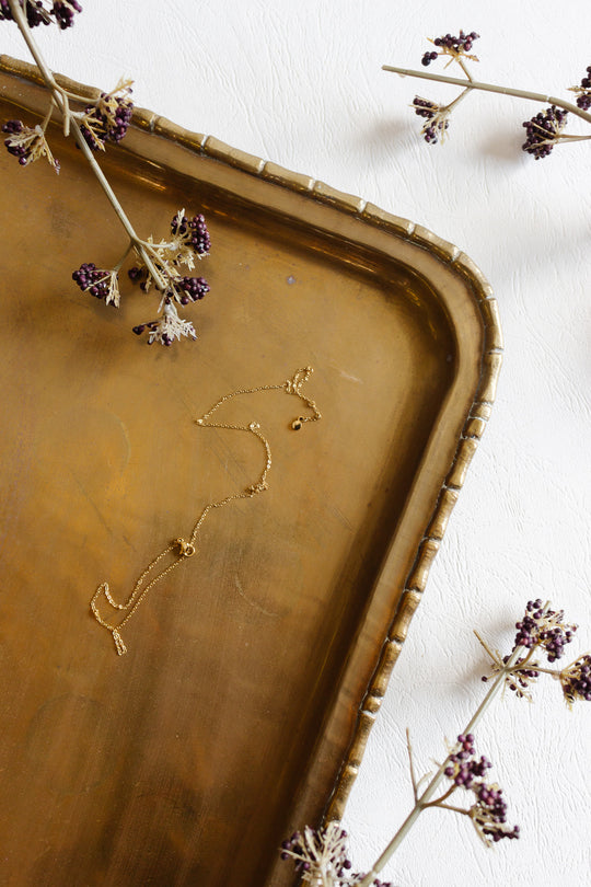 vintage brass serving tray with faux bamboo border
