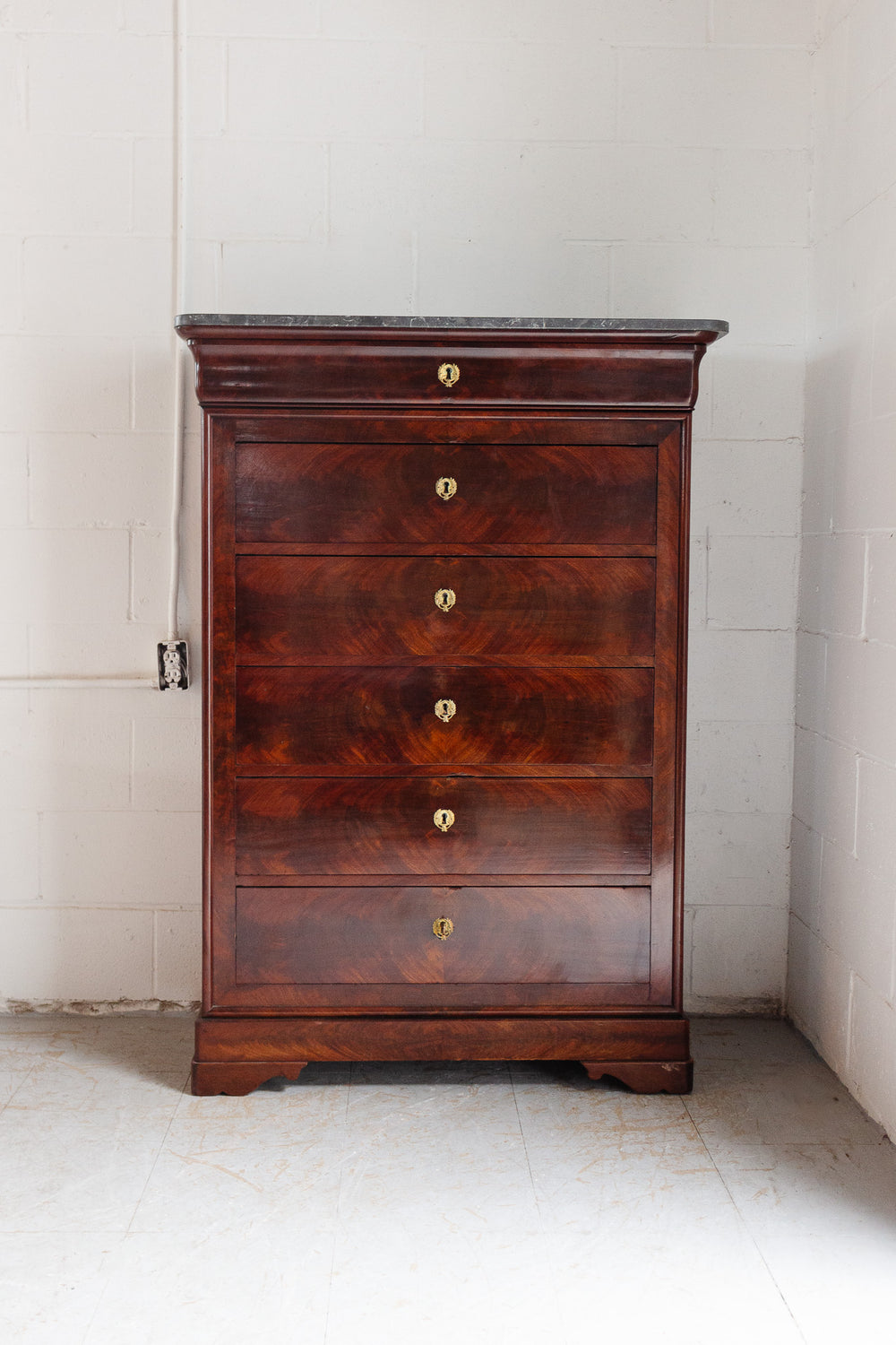 19th century flamed mahogany French Louis Philippe tall boy cabinet