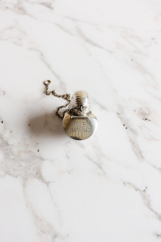 rare turn of the century Birmingham sterling silver nautilus tea strainer with monogram