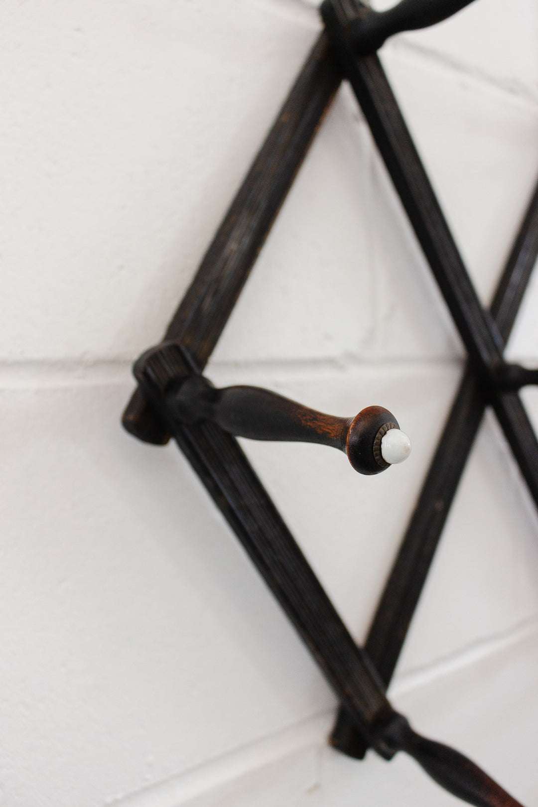 antique victorian accordian ebonized wood coat rack