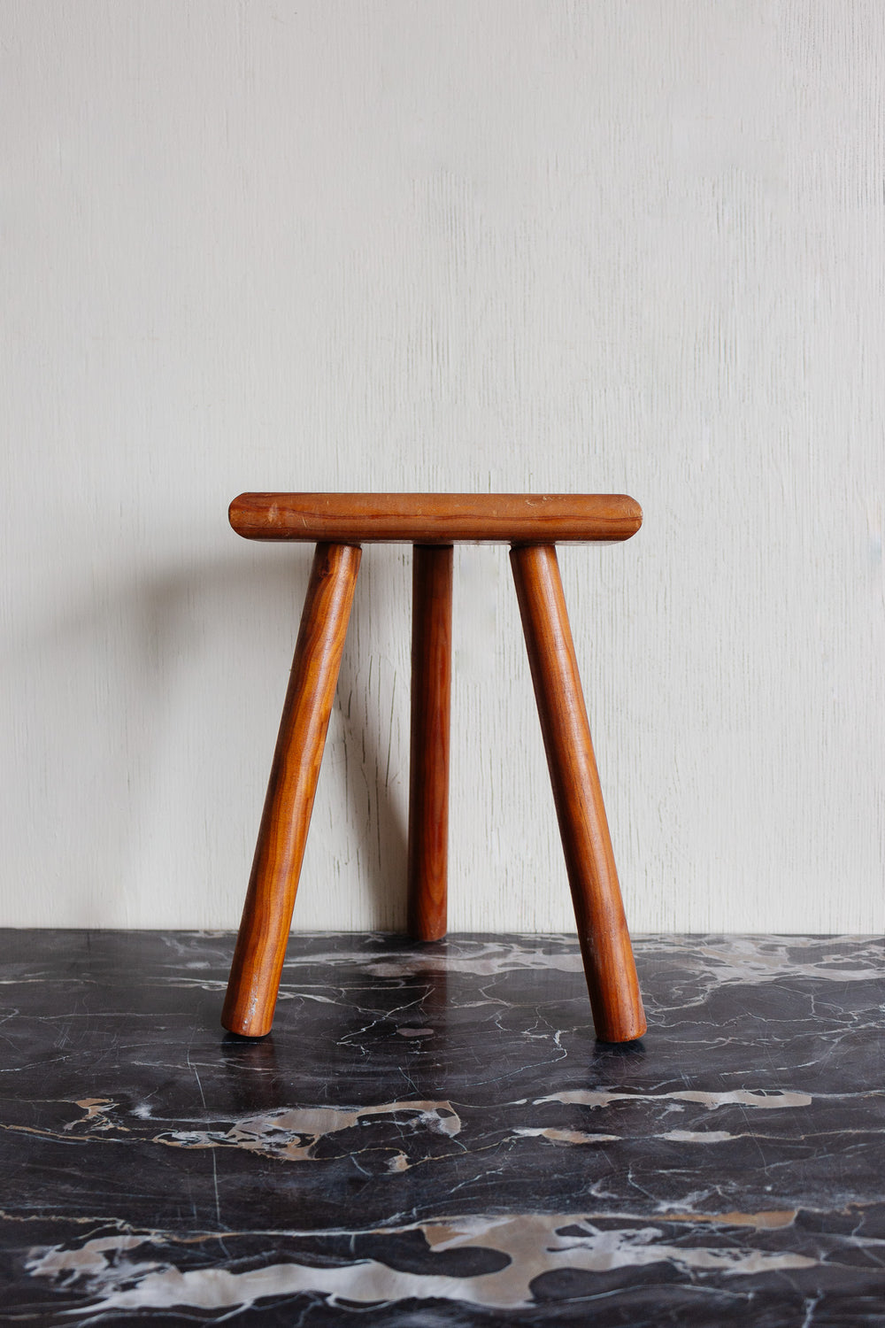 midcentury brutalist french half moon tripod stool