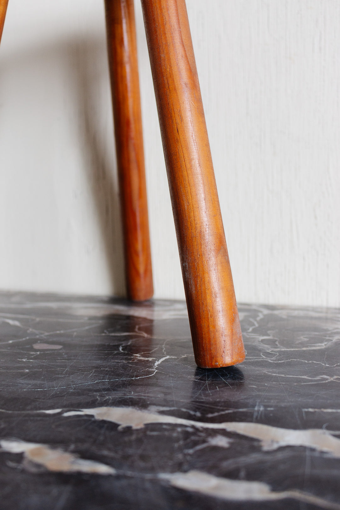 midcentury brutalist french half moon tripod stool