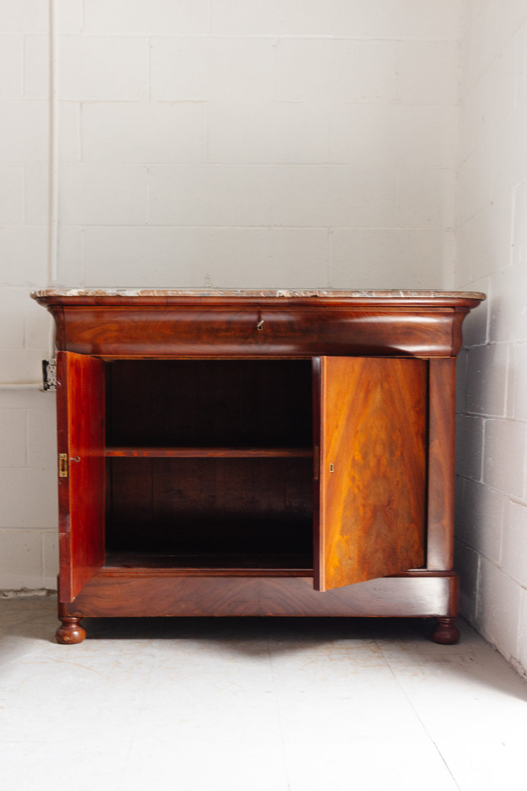 19th century French Louis Philippe flame mahogany and marble top side board