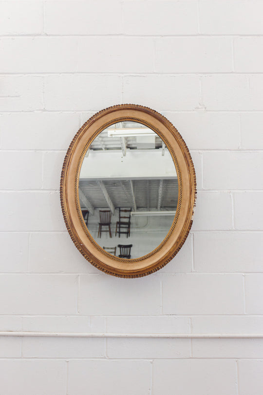 vintage French gilt wood and plaster oval mirror