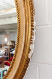 vintage French gilt wood and plaster oval mirror