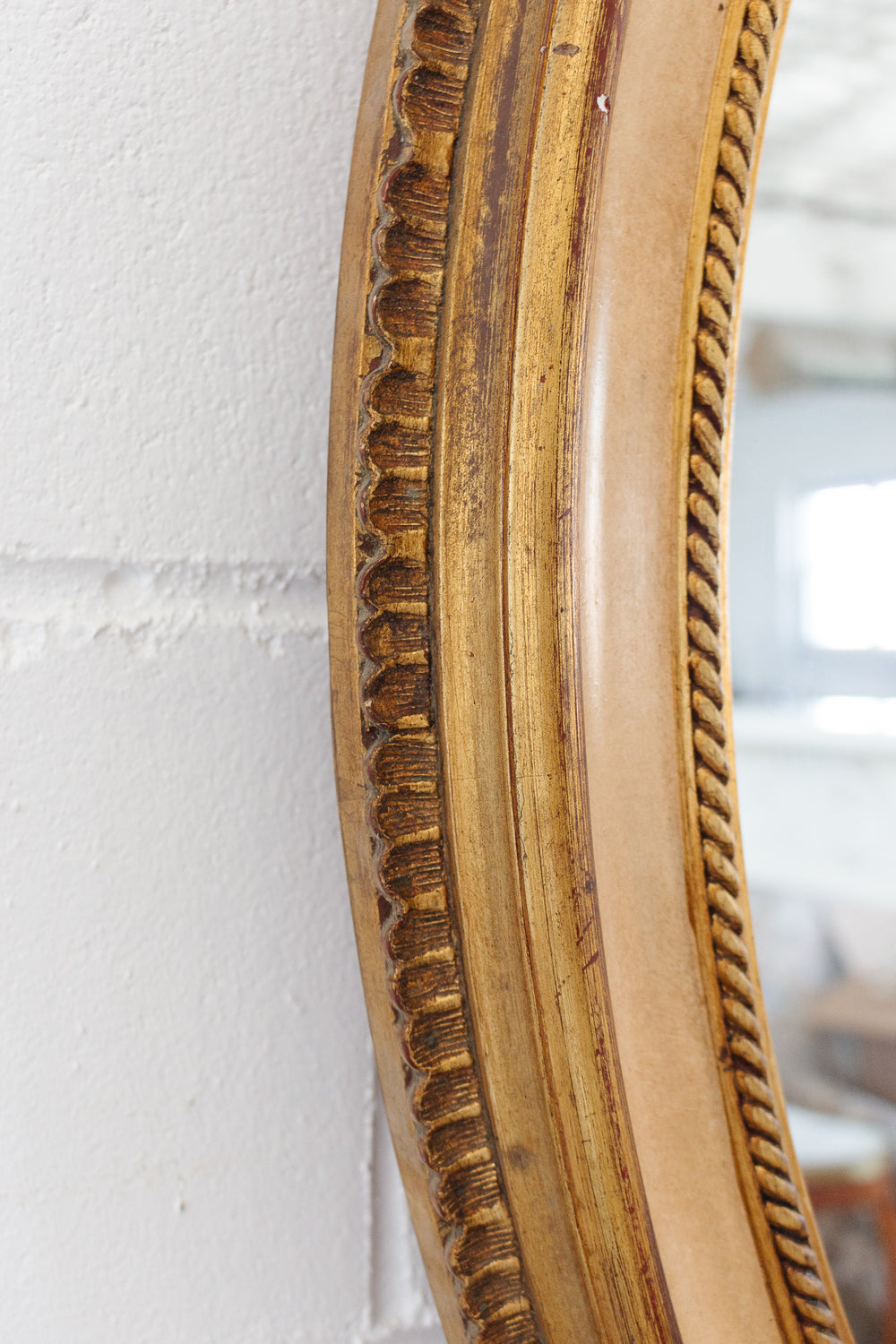 vintage French gilt wood and plaster oval mirror