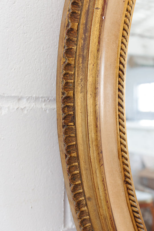 vintage French gilt wood and plaster oval mirror