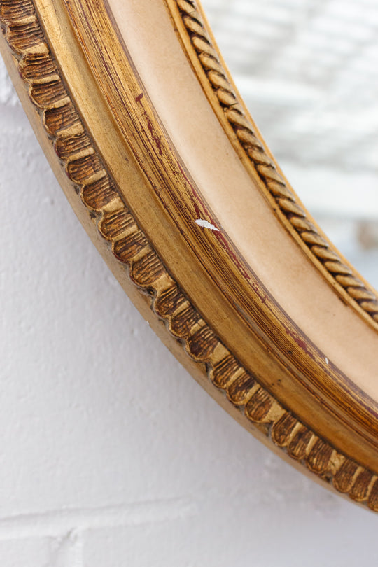 vintage French gilt wood and plaster oval mirror