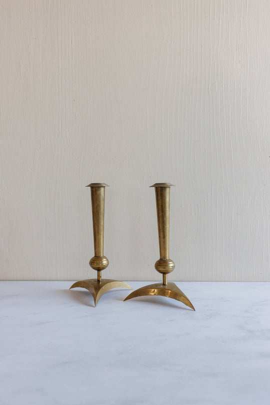 set of rare midcentury modern “atomic” brass candlesticks