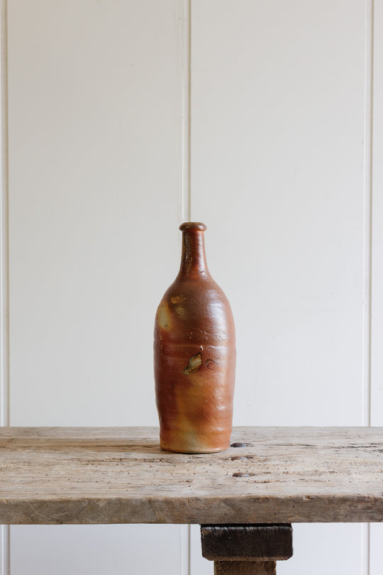 antique french stoneware liquor bottle, brown