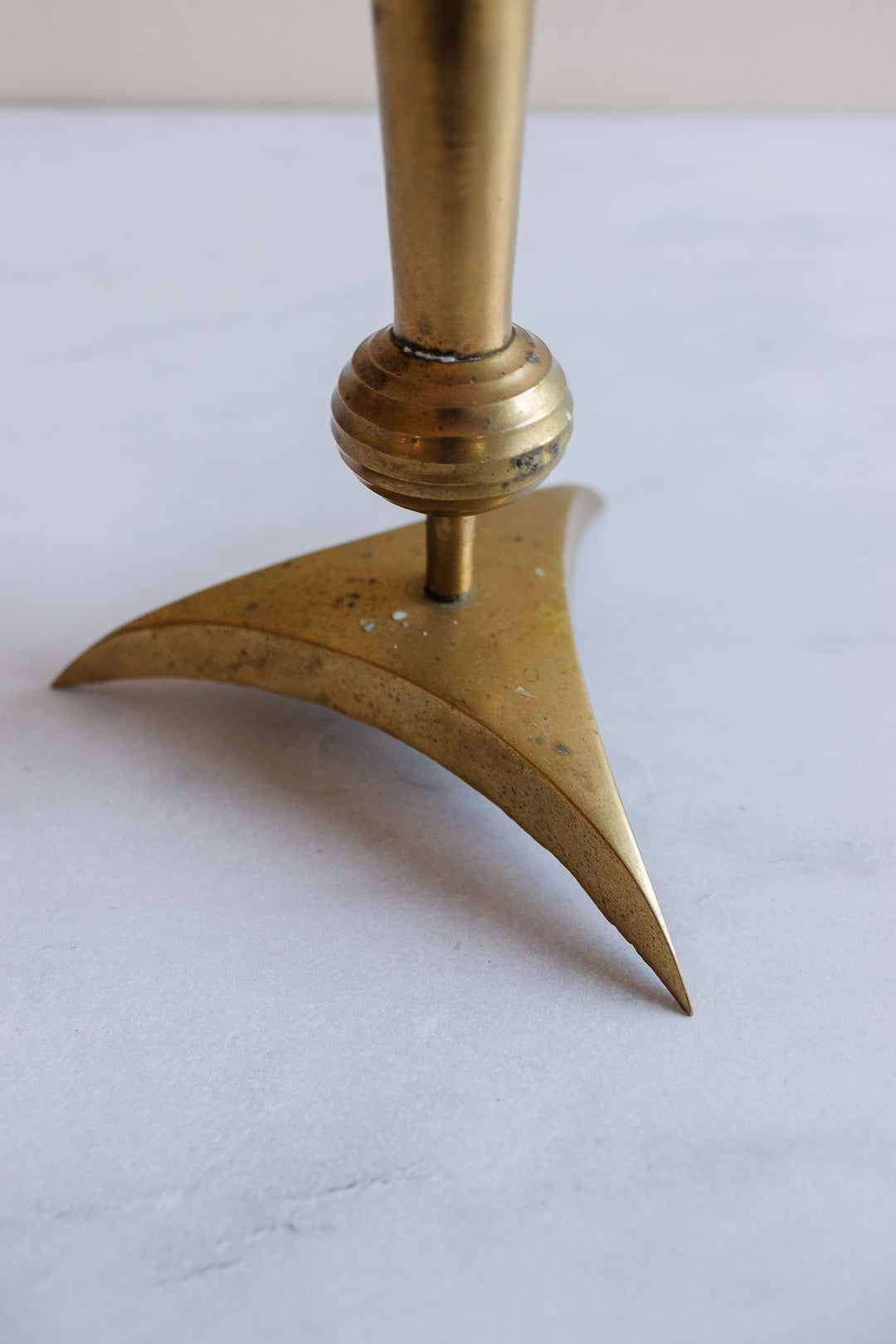 set of rare midcentury modern “atomic” brass candlesticks