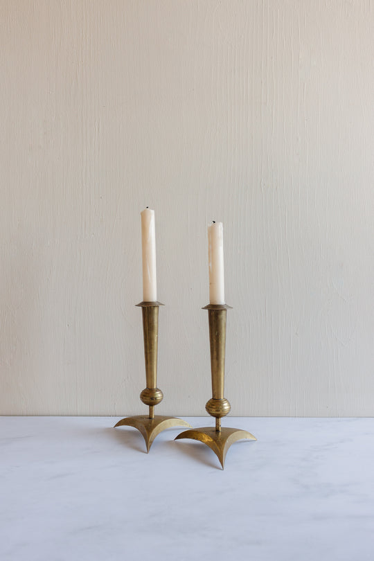 set of rare midcentury modern “atomic” brass candlesticks
