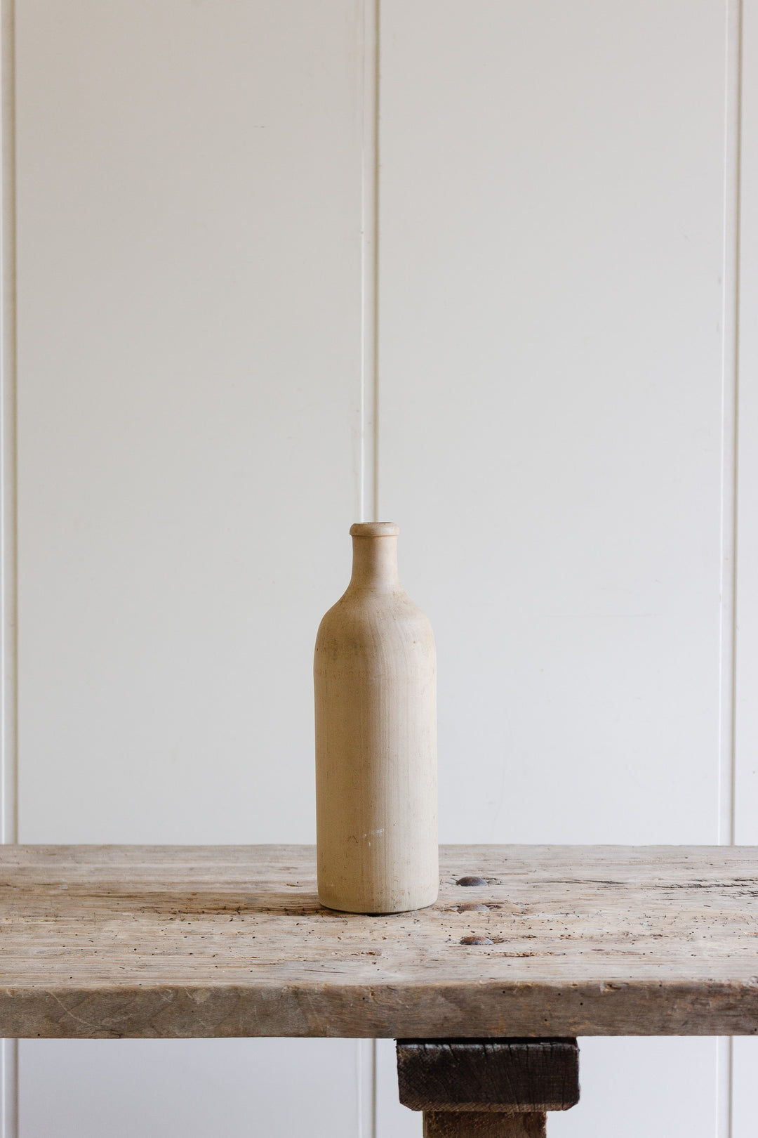 antique french stoneware liquor bottle, cream