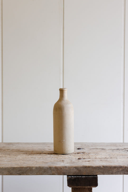antique french stoneware liquor bottle, cream