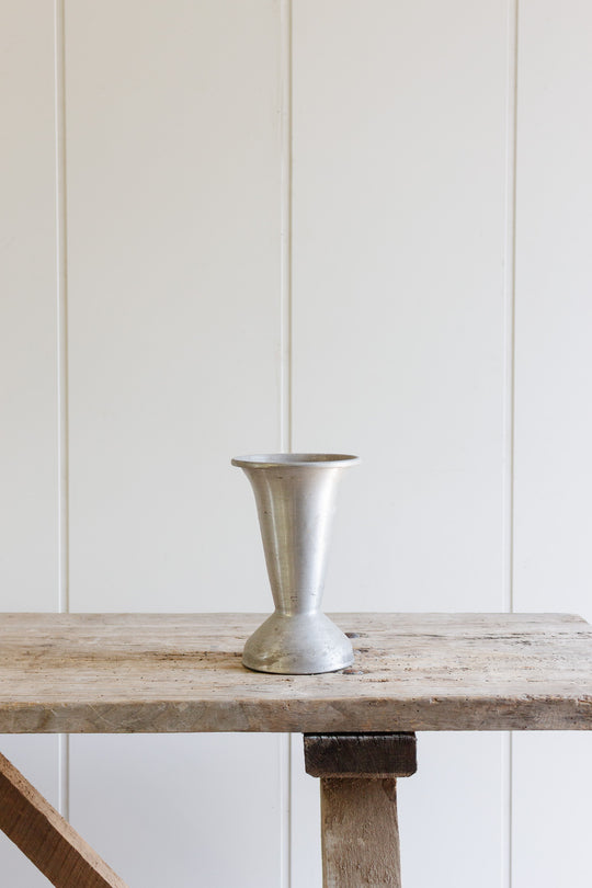 turn of the century weighted base zinc florist vase