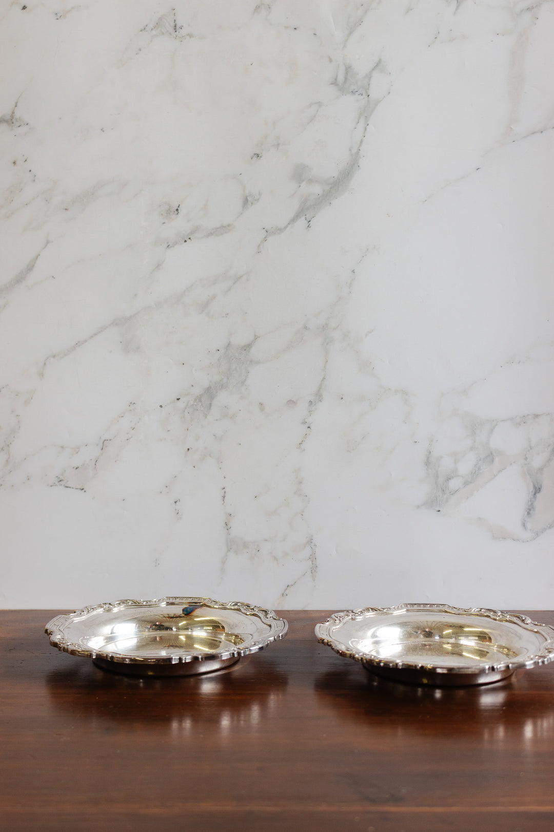 pair of antique french silverplate bottle coasters with poinçons
