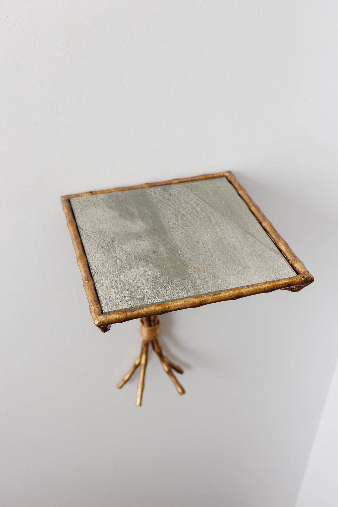 pair of midcentury brass faux bamboo wall sconces with mirrored top in the style of maison bagues