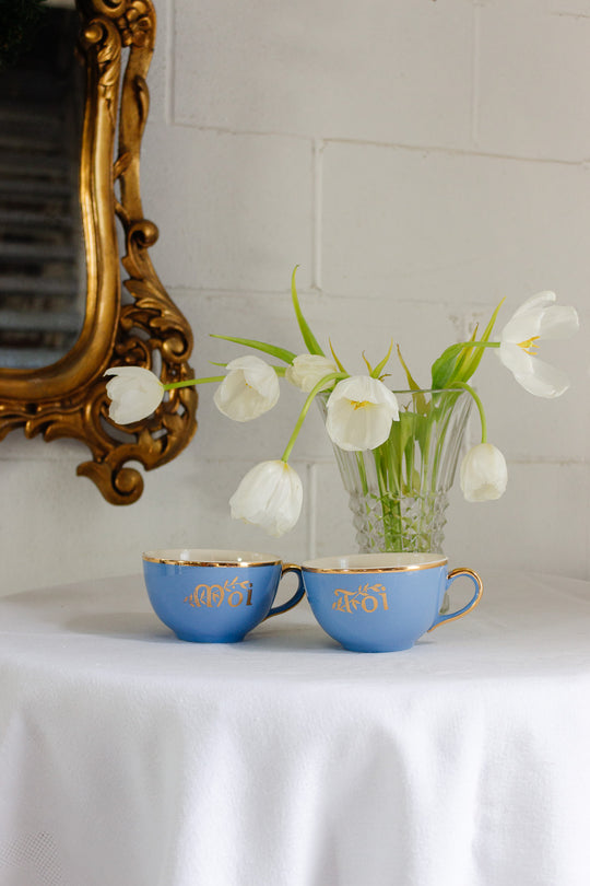 antique french "toi et moi" villeroy & boch gold and cerulean teacups