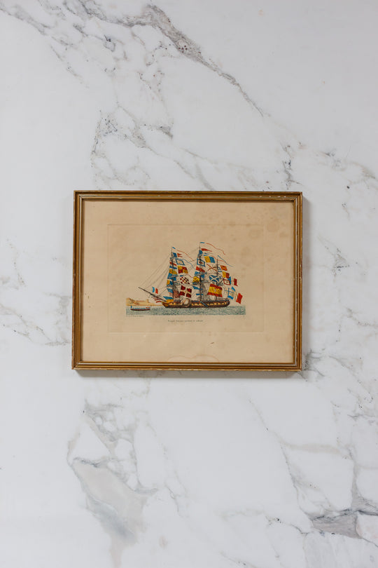 frégate française pavoisée et saluant