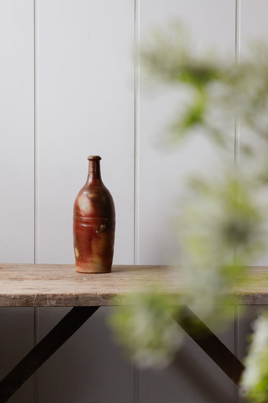 antique french stoneware liquor bottle, brown