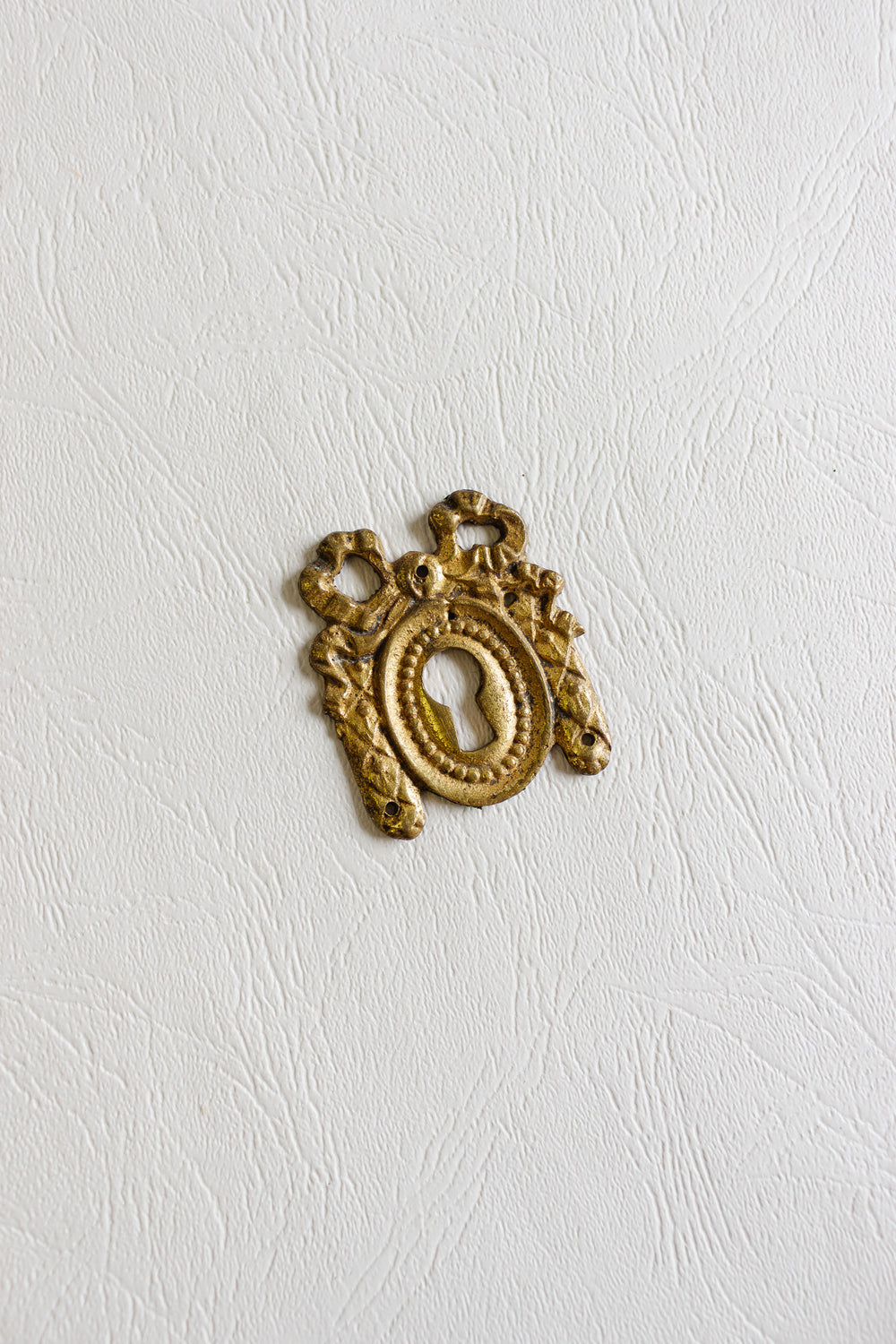 pair of antique french keyhole escutcheons