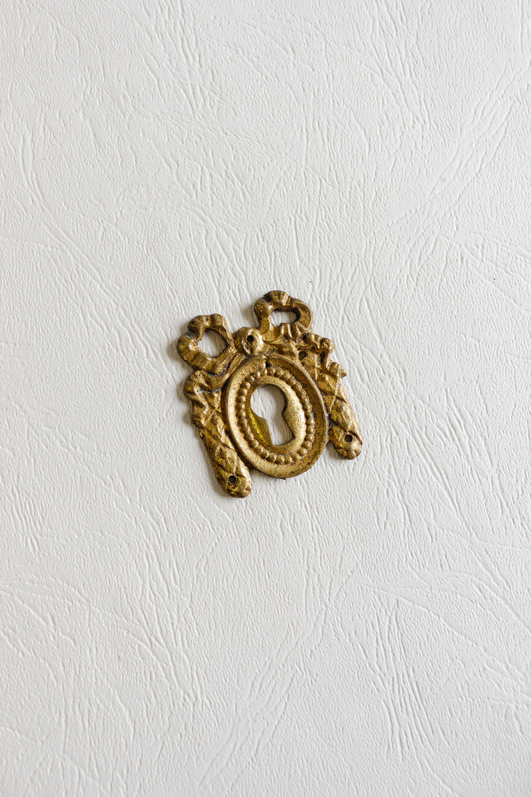 pair of antique french keyhole escutcheons