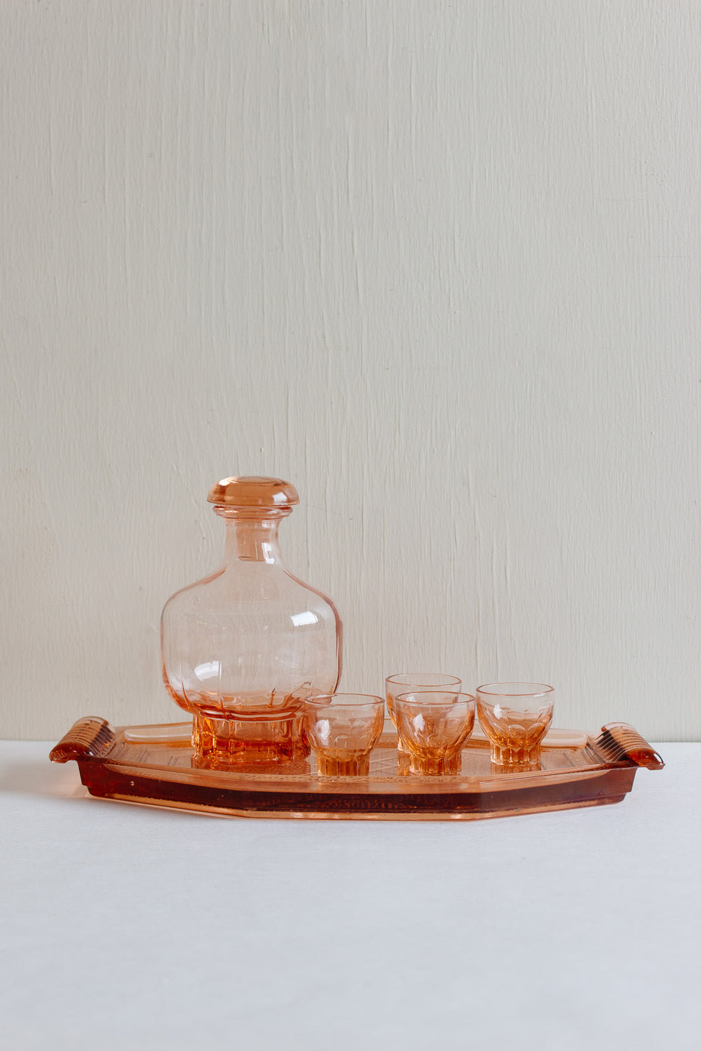 art deco french pink glass decanter with liqueur glasses and geometric tray