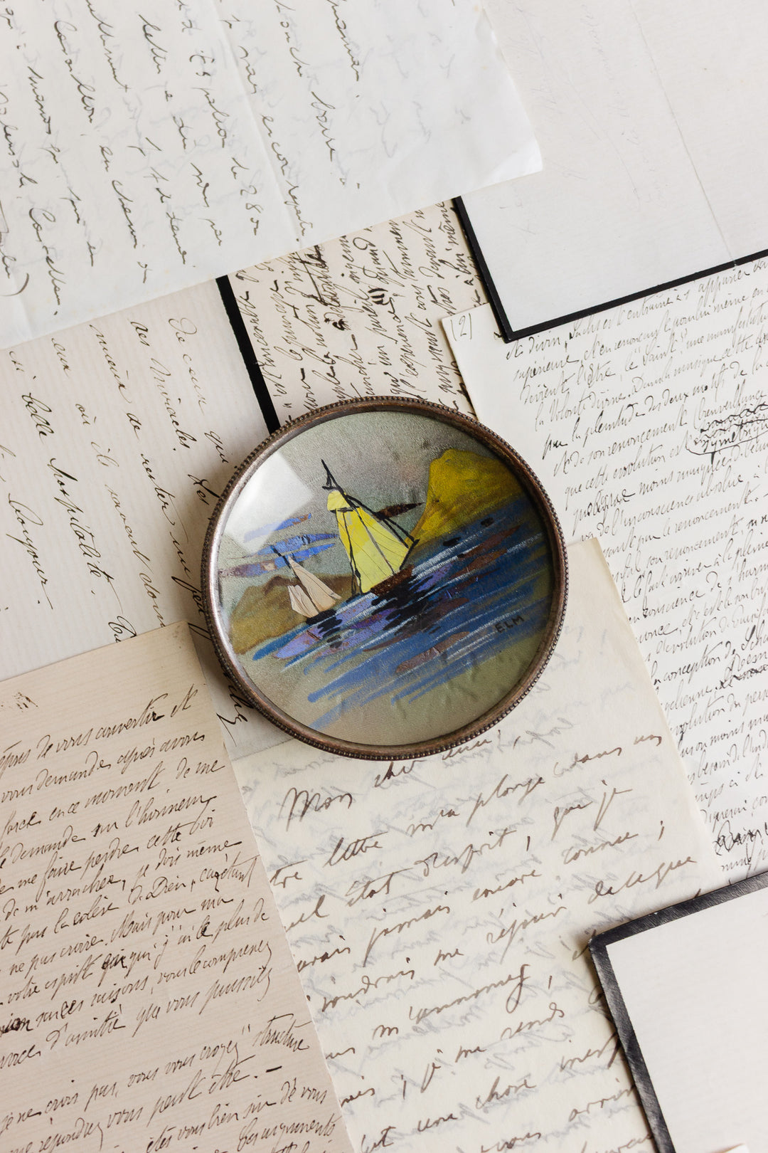 antique french trinket dish with oil on silk painting behind glass