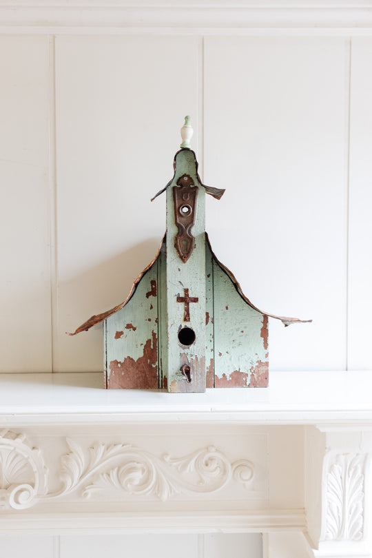 antique European wooden bird house with tin roof