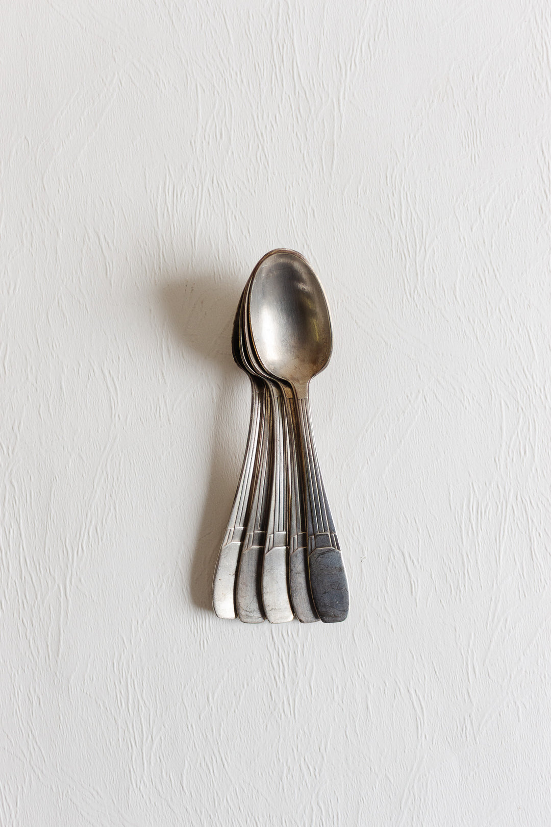 set of 5 art deco silverplate dessert spoons