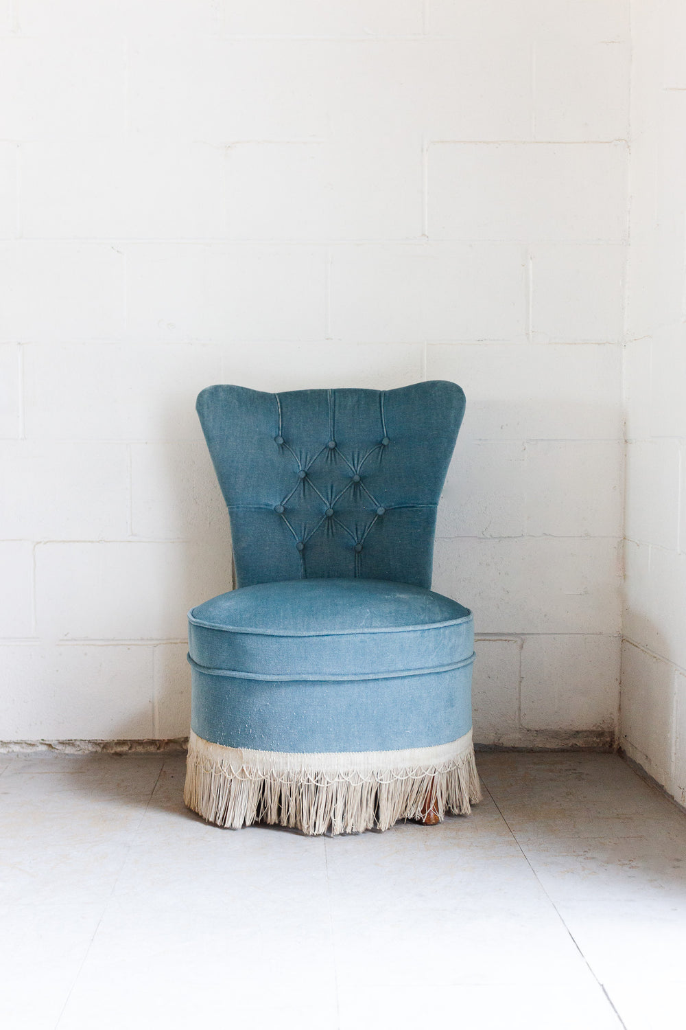vintage french blue slipper chair with fringe
