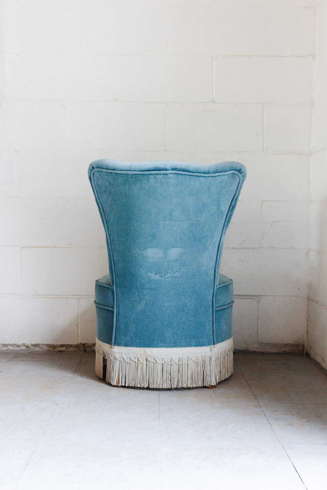 vintage french blue slipper chair with fringe