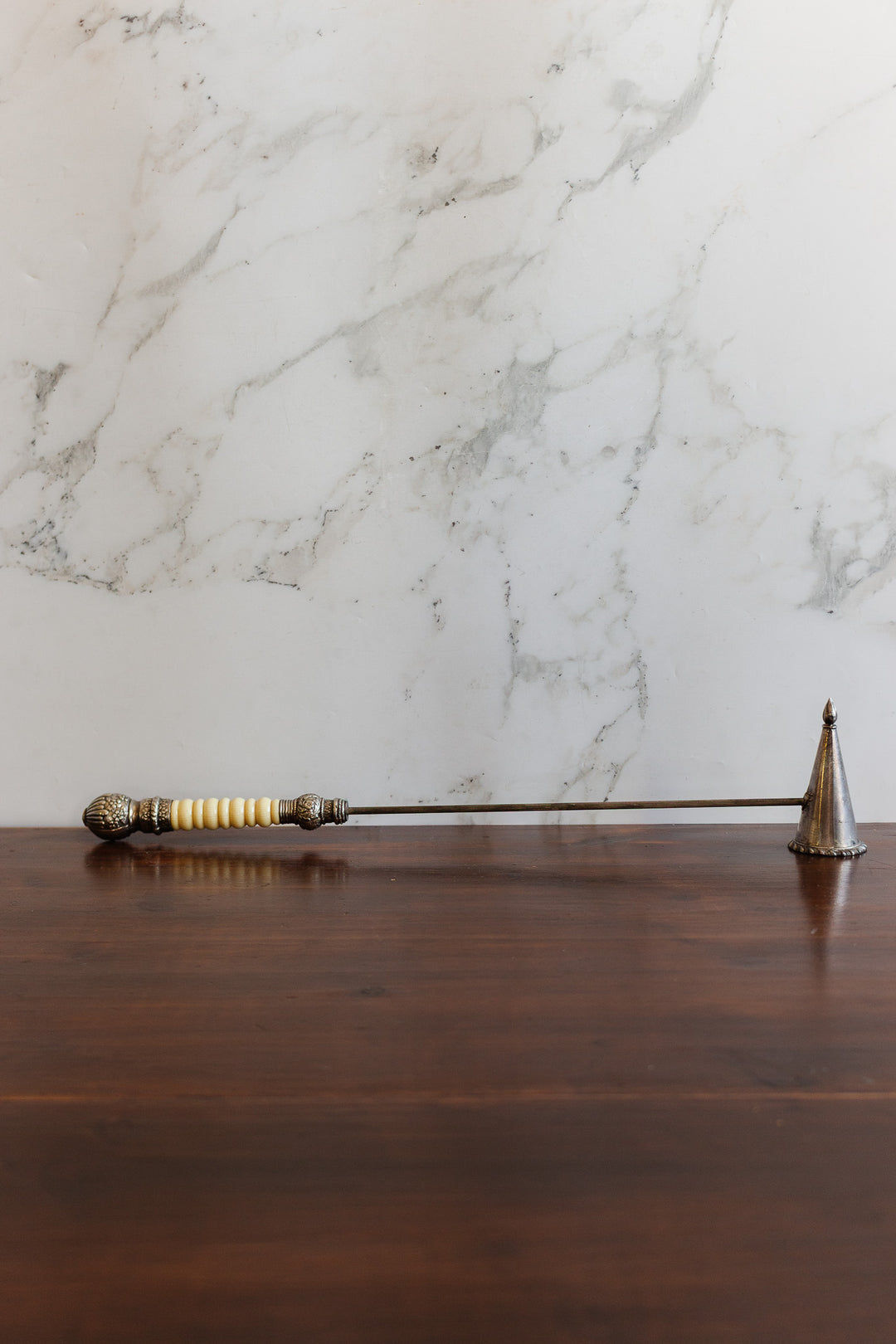 antique english extra long silverplate and "faux bone" french snuffer