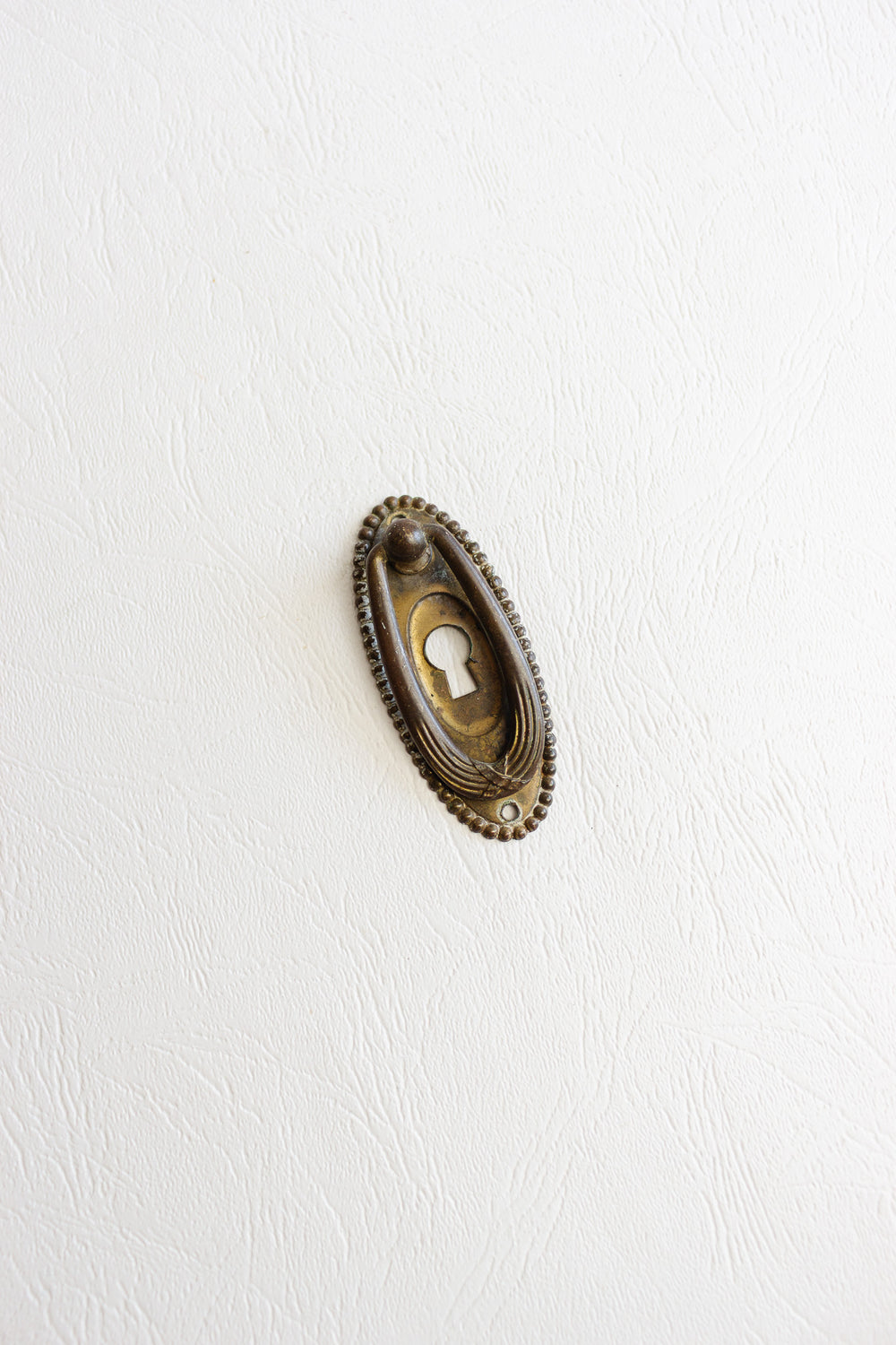 antique french keyhole escutcheon