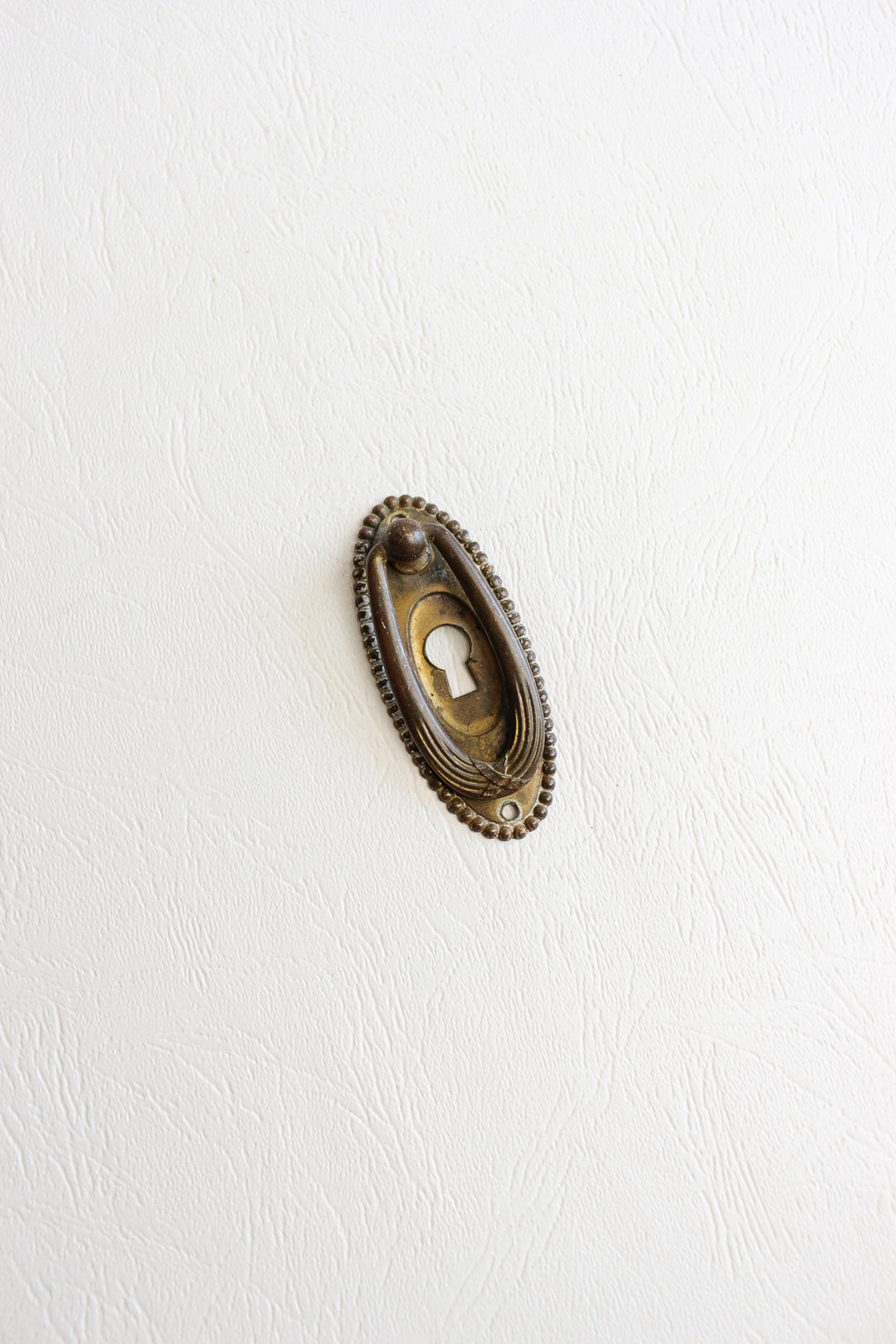 pair of antique french keyhole escutcheons