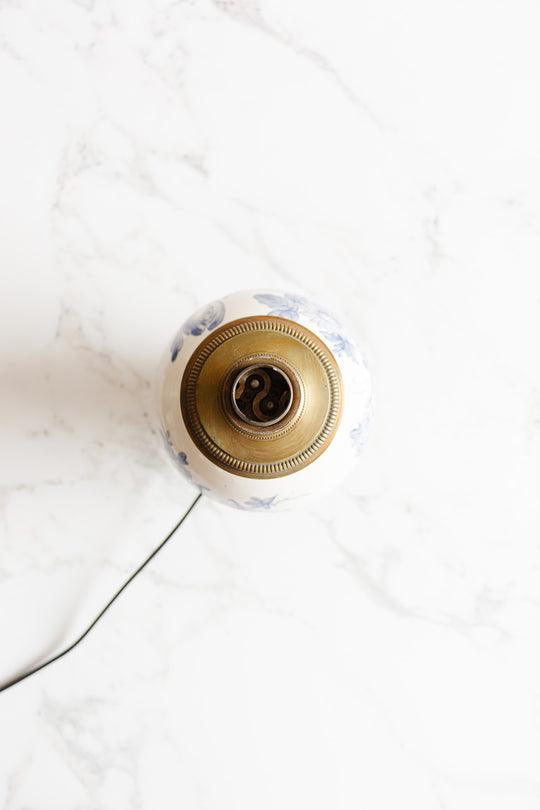 antique french porcelain lamp with brass footing