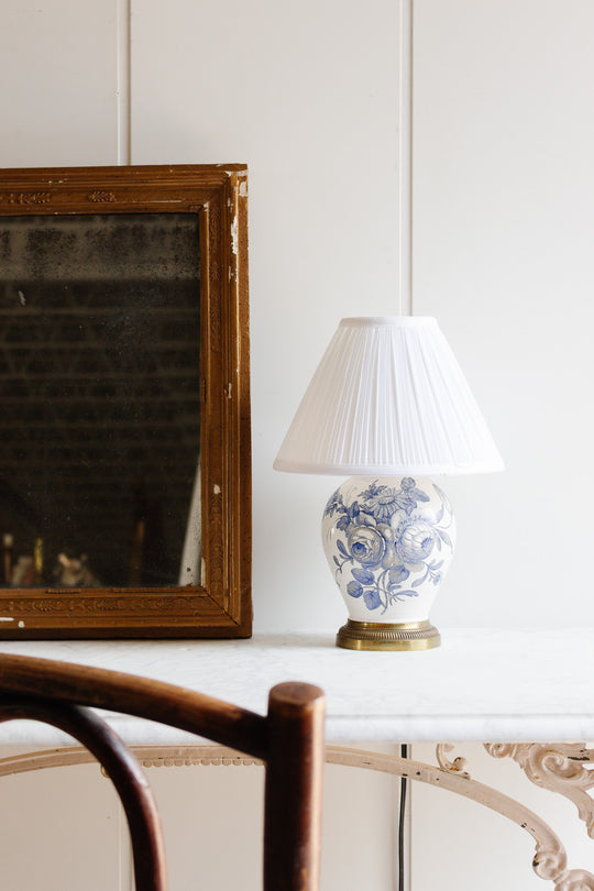 antique french porcelain lamp with brass footing