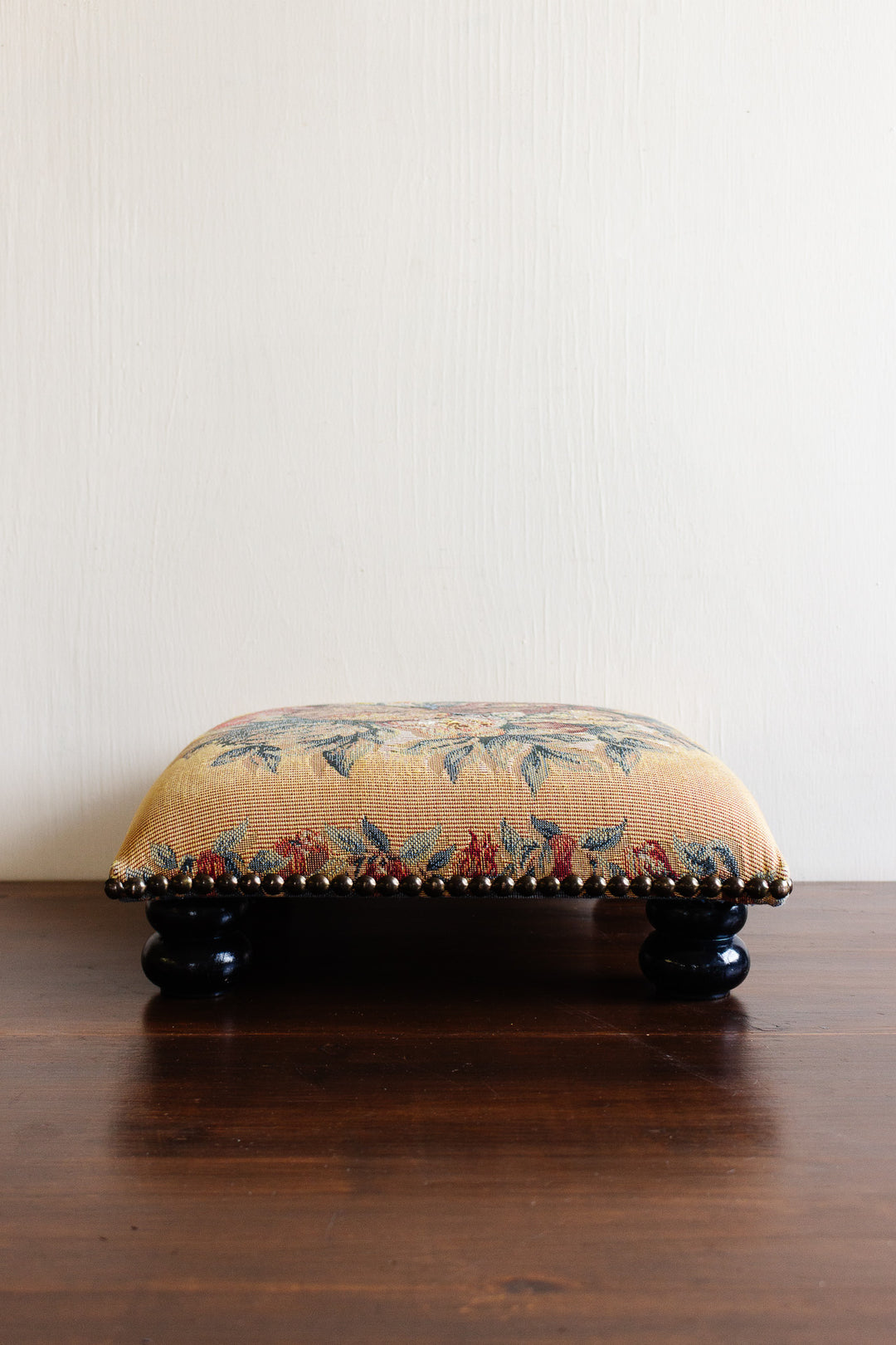 vintage french upholstered stool with turned wood legs