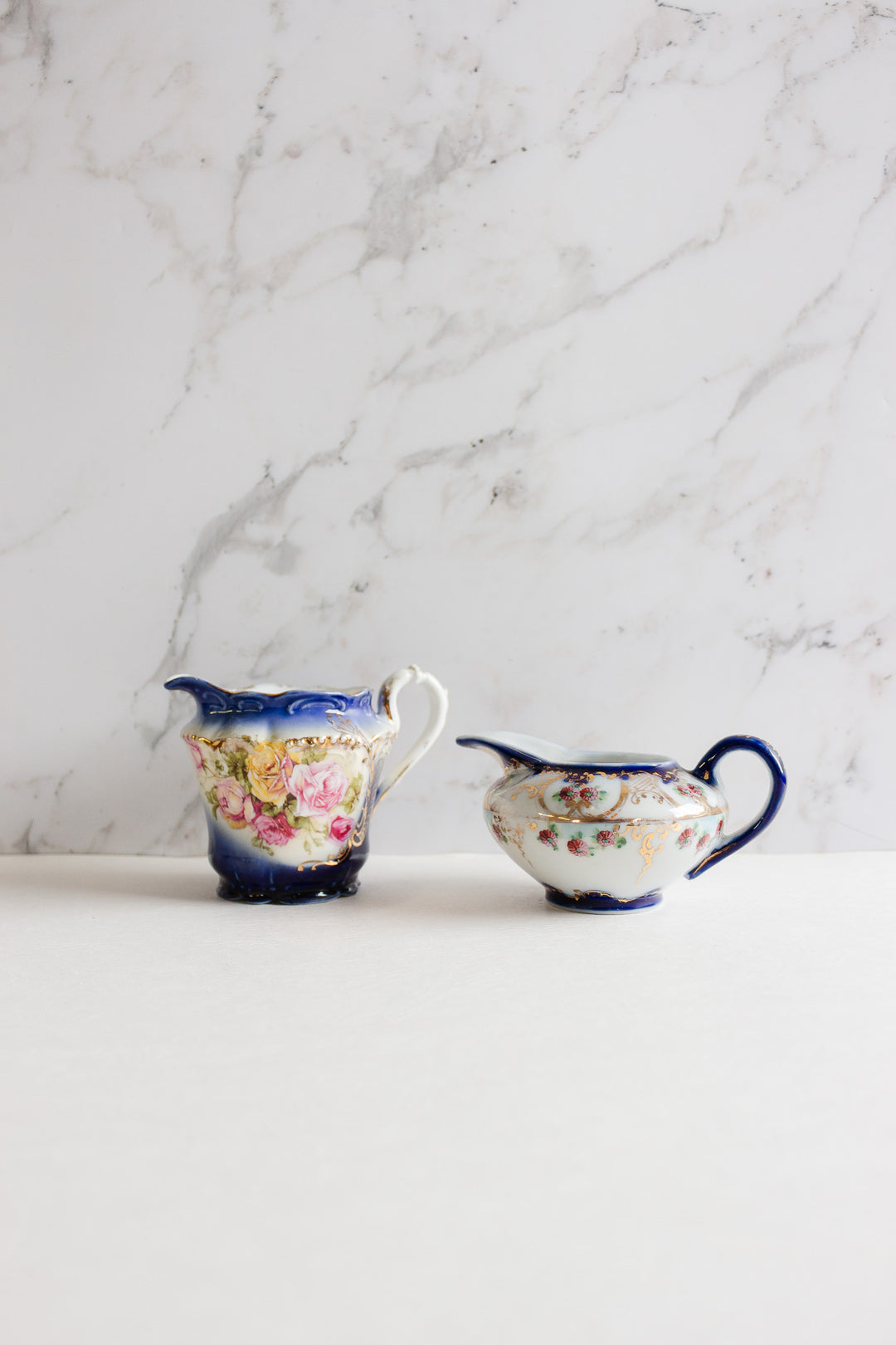 pair of vintage european porcelain creamers