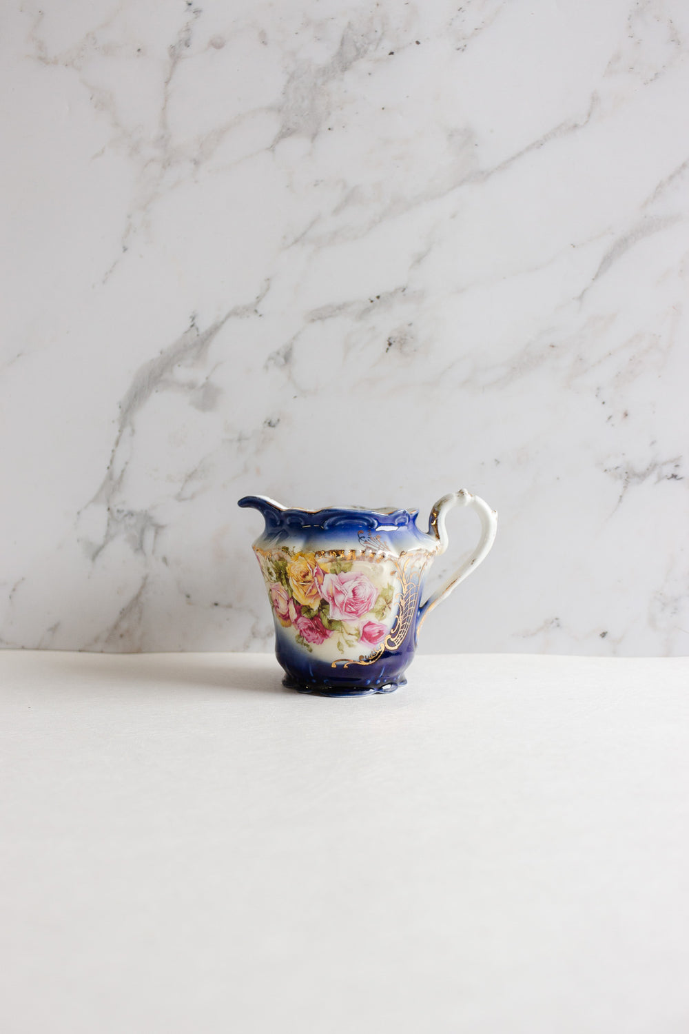 pair of vintage european porcelain creamers